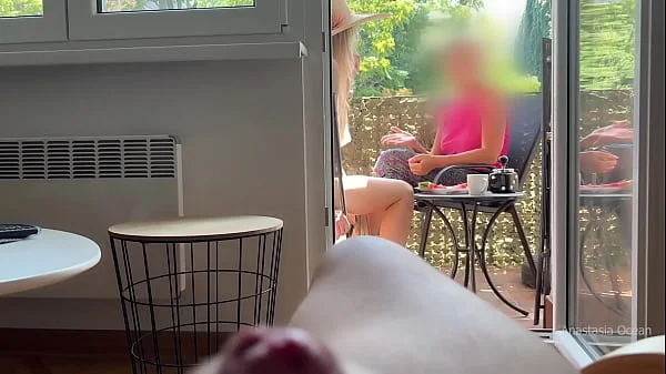 My husband is jerking off and cum in front of my stepmom a while we talk on balcony.
