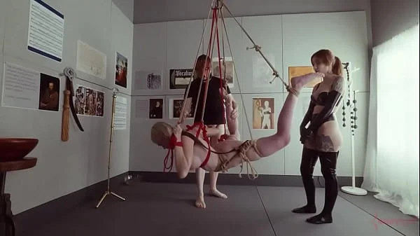 Submissive bondage puppet Rebel Rhyder sucks cock and eats ass in a demented threesome game