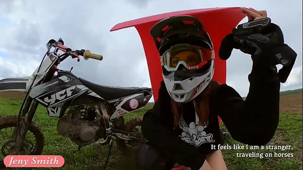 Naked woman riding a Dirt Bike