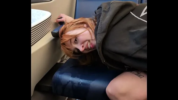 Pixie Pink Public Pissing and Squirting in a Busy Train During the Day