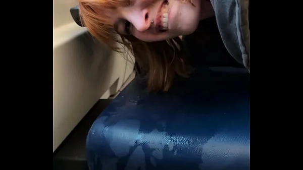 Pixie Pink Public Pissing and Squirting in a Busy Train During the Day