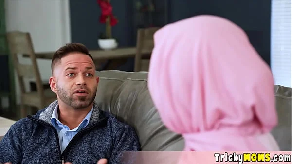 Busty MILF in hijab hesitant to fuck but Mickey managed to persuade her into a quickie