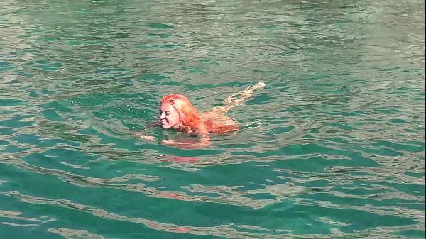 Blue water and a naked girl!