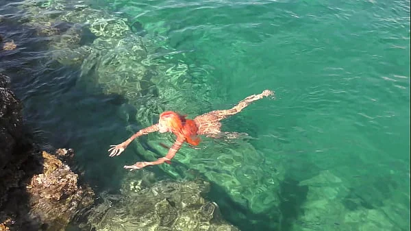 Blue water and a naked girl!