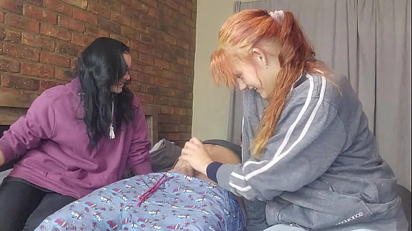 Two shy girls playing with my massive cock