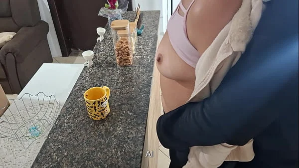 A stepdaughter is surprised while having breakfast.