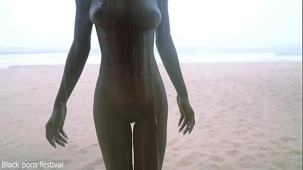 Skinny ebony village girl dancing naked in the rain with her perfect slim body