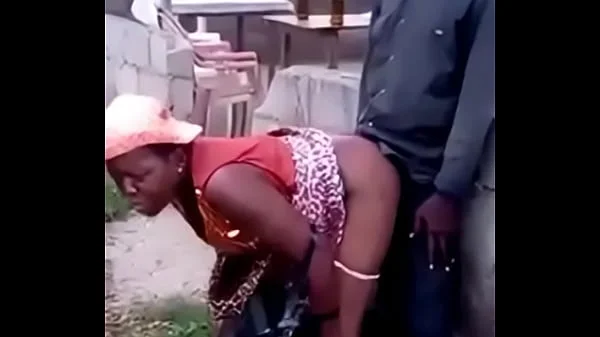 African woman fucks her man in public