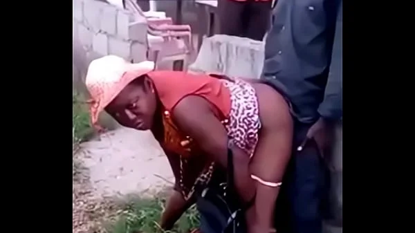 African woman fucks her man in public