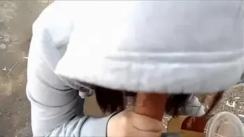 My cute asian girlfriend sucking me off in a public park and swallowing