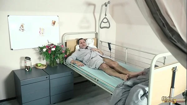 Teen nurses fuck old grandpa in a fake hospital bed and give sloppy blowjob