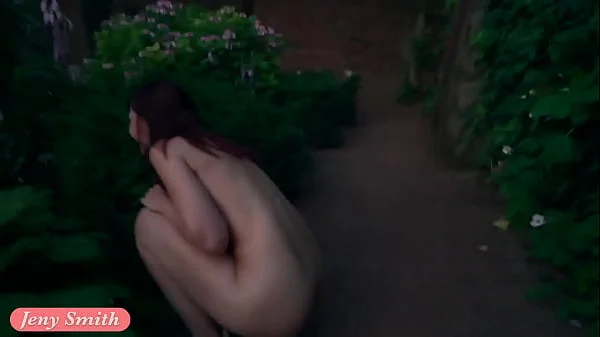 Jeny Smith is walking naked through an abandoned factory.