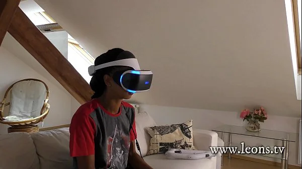 Isabel flashes her pussy and ass under her panties with a tshirt and she has a new game in her Playstation VR but she needs..