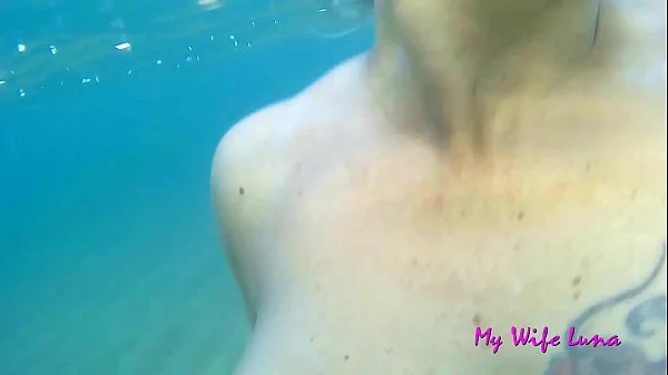 This Italian MILF wants cock at the beach in front of everyone and she sucks and gets fucked while underwater