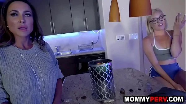 Stepmom and stepdaughter sucking stepson's cock