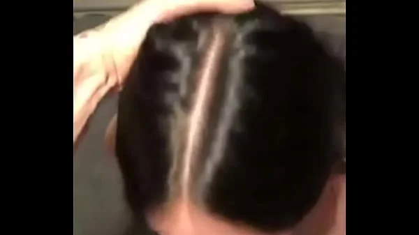 She sucks my cock while she's tied up