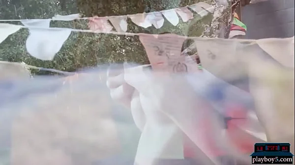 Ebony teen model Scarlit Scandal outdoor striptease for Playboy