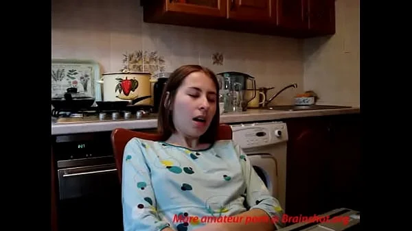 Teenie fingers to orgasm in kitchen