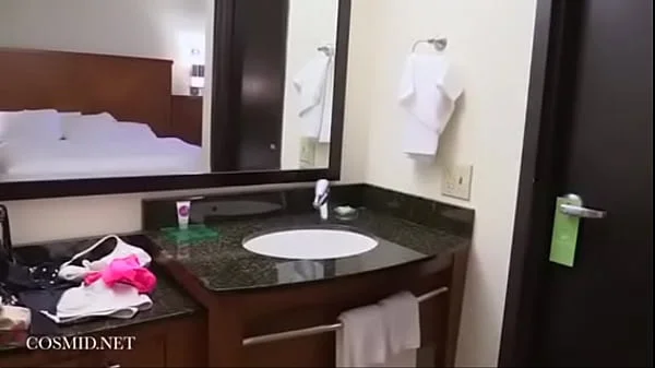 Amanda Love trying on bras