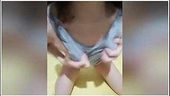 Teasing Asian Teen Grinding In Jumpsuit