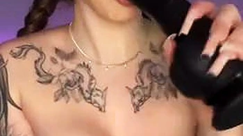 The long-haired nymph in a cat costume provides a deep throat with a yam-sized