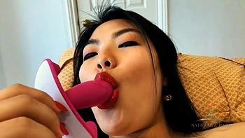 Watch Nari Park play with her hairy Asian pussy while adding a toy to the mix: Porn
