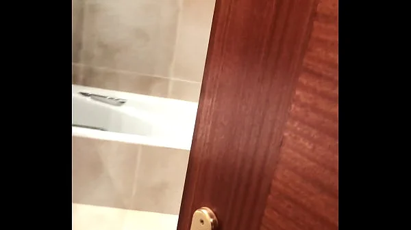 Pervert films blonde girl during orgasm in hotel shower