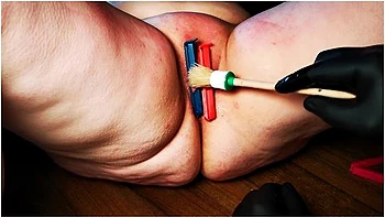 Labia And Clit With Candle, Clips And Brush