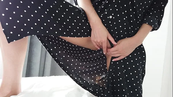 Sexy girl in a dress showed perfect natural tits and masturbates wet pussy