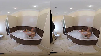 Blonde In Bathroom With Toy