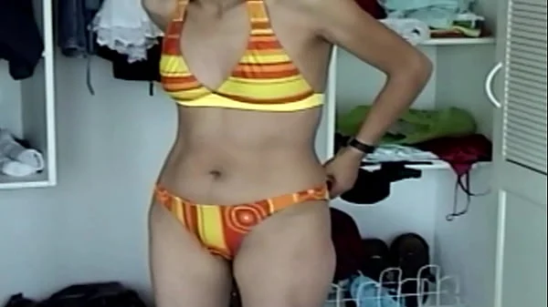 Hidden camera - Spying on my wife's beautiful sister's hairy pussy while resting on the beach