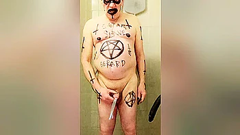 Satan slave poses his own shit feet