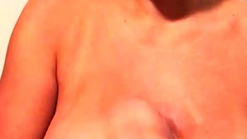 Busty brunette babe tease you with her big boobs