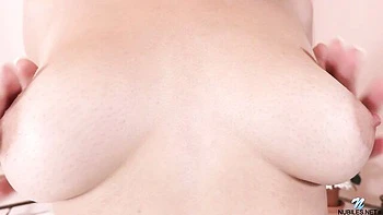 Busty brown-haired chick Mia Fox demonstrates her nice shaved pussy