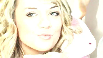 Sexy petite lesbians teasing the camera in close up