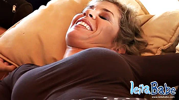 Horny blonde MILF Leila gets her tits out for teasing