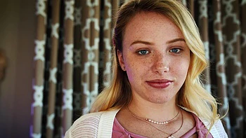 Blonde teen Dixie Lynn shows her favorite blowjob techniques in a steamy scene.