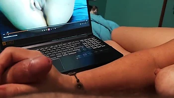 Watch Bella Spank His Cock While Watching Porn