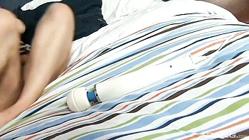 An awesome redhead chick Casey Mitchell is playing with her sex toy