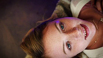 Two freckled teens Dixie Lynn and Madison have fun on the sofa