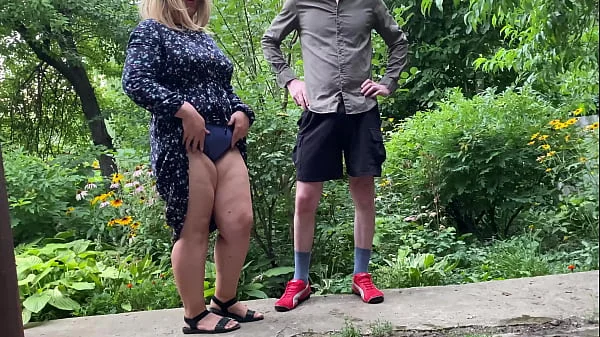 Gorgeous MILF helped a stranger pee outside and pee herself