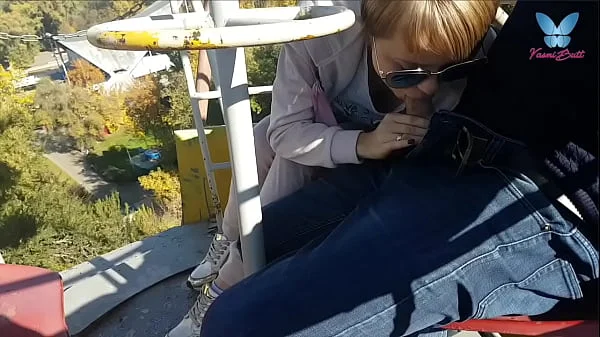 Public blowjob on the ferris wheel from shameless whore