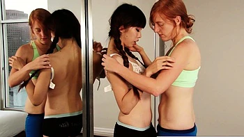 Asian cheerleader squirts while fingered by hairy redhead